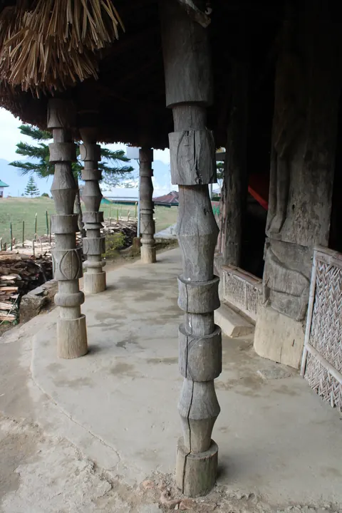 Carved wooden pillars of a traditional house
