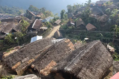 Thatched roofs of a hillside village