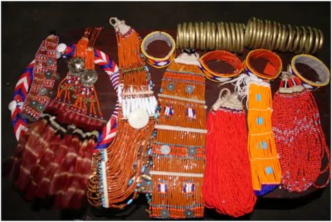 Traditional beaded necklaces and brass ornaments